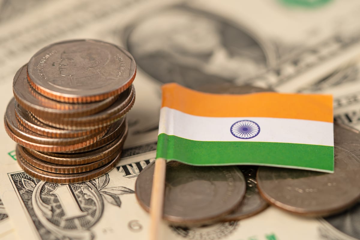 Indian currency and flag representing domestic private-market transactions