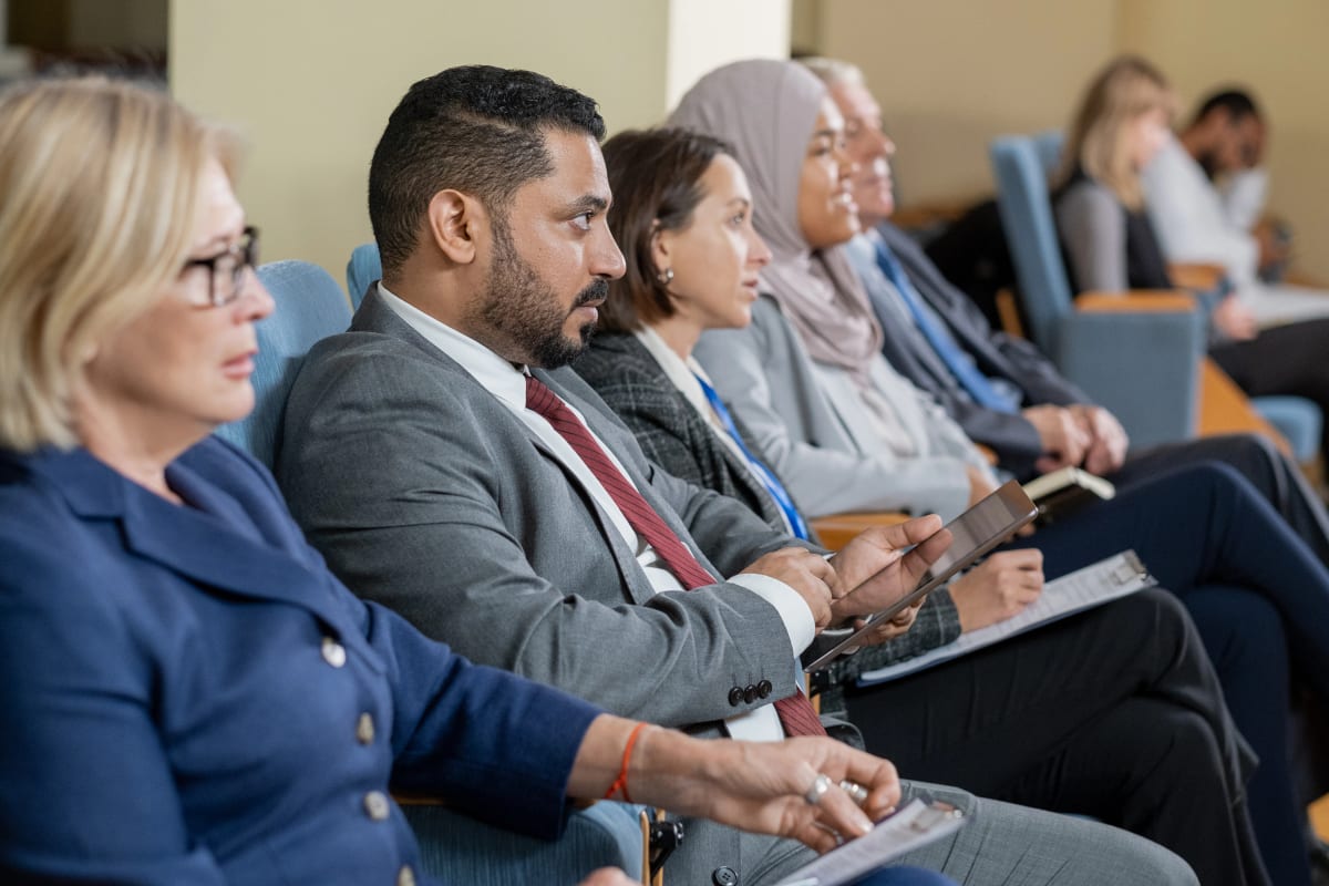 Institutional investors attending a professional transaction briefing