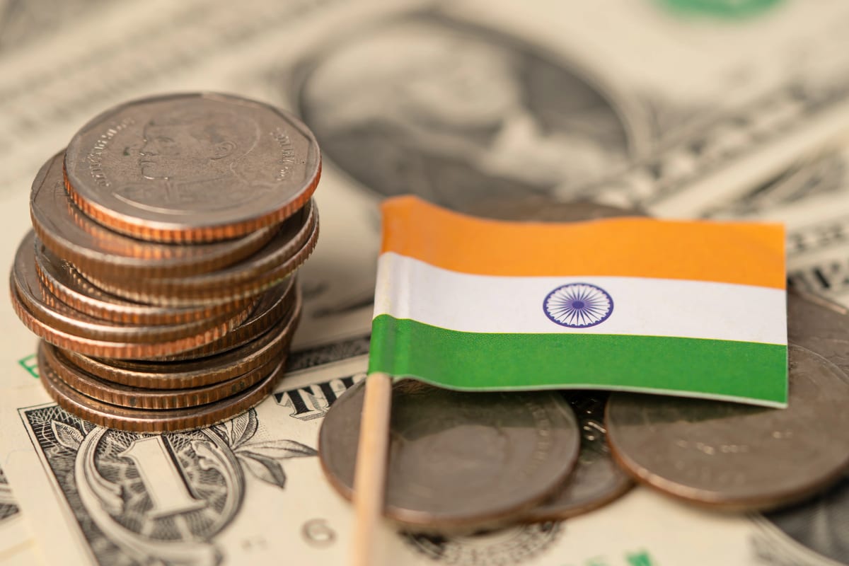 Indian currency and flag representing domestic private-market transactions